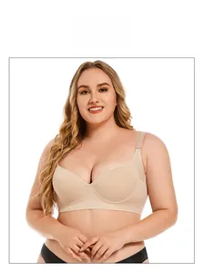 Close-up of beige plus size bra with wide adjustable straps and supportive side wings