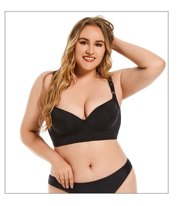 Close-up of black plus size push-up lingerie set with smooth cups and lace details
