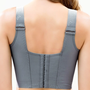 Close-up of gray-blue bra back featuring wide straps and multi-row metal hook closure
