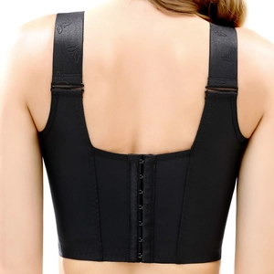Close-up of black seamless plus size bra featuring wide straps with butterfly jacquard detail