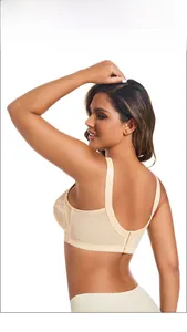 Detail of wide elastic straps and U-shaped back on beige lace plus size bra