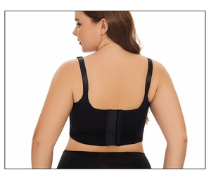 Detail view of the black sports bra featuring a U-shaped back and multi-row hook closure