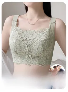 Detailed view of pale green floral lace bra with wide straps and scalloped edges
