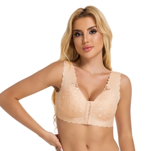 Sultry nude lace front-closure bra with wireless push-up design on model with white background