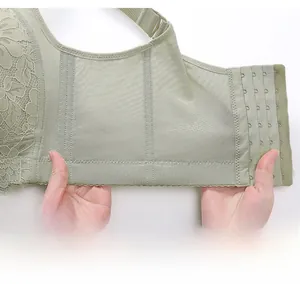 Detail showing elastic breathable mesh wings on full coverage lace bra for smoothing sides