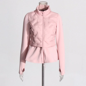Detail of pink slim-fit jacket with diamond quilting and adjustable drawstring waist