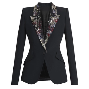 Detail of colorful rhinestone embellishments on the lapel of this black fitted blazer