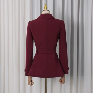 Back view of burgundy slim-fit blazer with belted waist and notched lapel detail