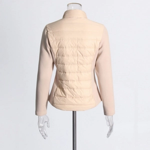 Detail view of back quilting and fabric splicing on this slim beige jacket