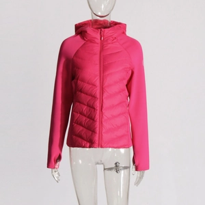 Detailed front view of bright pink hooded jacket with quilted chest and thumbhole cuffs