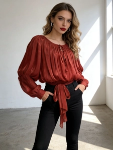 Elegant brick red long sleeve pleated blouse with lantern sleeves and waist tie belt