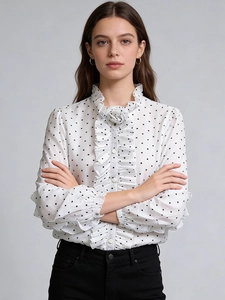 Elegant white polka dot blouse with ruffles and floral neck detail for women
