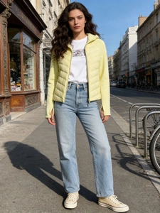 Slim fit hooded light down jacket in soft yellow with light blue straight jeans