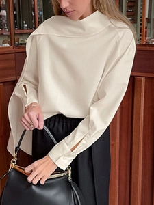 Elegant off-white long sleeve shirt with unique asymmetrical draping neck for women