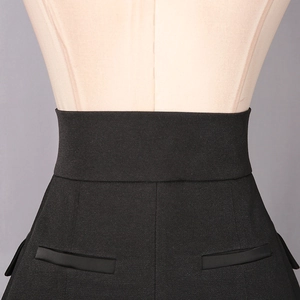 Detailed back view of high-waist black skirt featuring decorative satin stripes