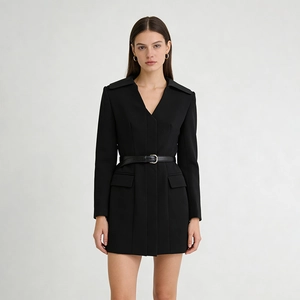 Detail view of a black V-neck blazer dress with a slim leather belt and symmetrical flap pockets