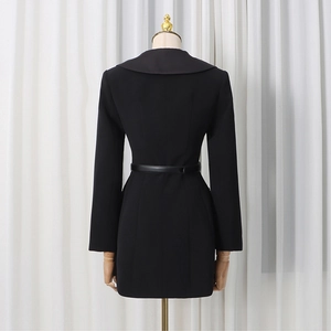 Back view of slim fit black dress with square sailor collar and thin waist belt