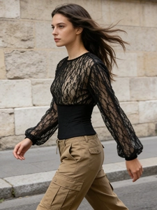 Chic black lace long sleeve top with waist corset paired with khaki cargo pants