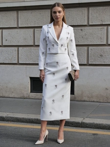 Elegant white two-piece set with rhinestone flowers, cropped jacket and high waist skirt