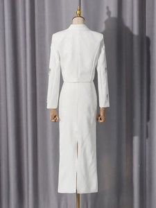 Elegant white two-piece set with rhinestone tassels on blazer and slim maxi skirt