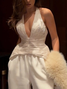 Haut licou blanc sexy avec fronces et pantalon large à taille haute assorti
