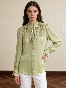 Pale green sequin satin shirt with bow-tie scarf neck and ruffle details for women