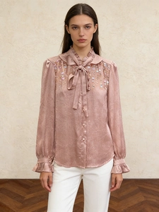 Elegant sequined satin blouse for women with a bow tie collar and ruffled sleeves