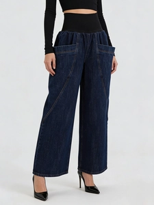High-waist wide-leg denim jeans in dark blue with elastic waistband and large side pockets