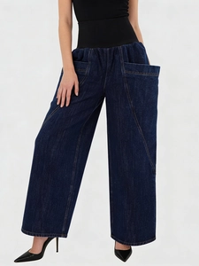 Women's dark indigo wide-leg jeans with high elastic waist and oversized cargo pockets