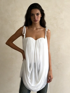Elegant white pleated camisole with thin straps and a flattering sweetheart neckline