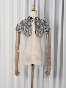 Elegant beaded black mesh shawl with silver floral patterns and long fringe tassels