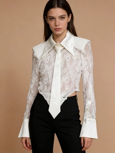 Elegant white lace long sleeve bodysuit with satin pointed collar and black trousers