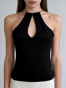 Slim fit black halter top with gold chain collar and teardrop cutout detail for women
