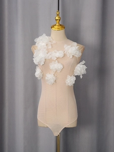 Slim fit mesh bodysuit featuring white 3D floral appliques and sleeveless crew neck design