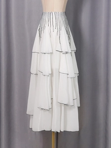 Elegant high-waist white layered chiffon skirt with black contrast ruffle edges