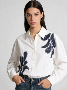 Minimalist white shirt with blue sequin leaf embroidery and casual long sleeves