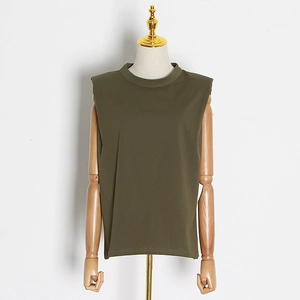 Detailed close-up of dark green crewneck sleeveless top with premium knit fabric texture