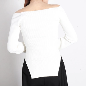 Detail of white off-shoulder knit sweater with vertical ribbing and back view fit