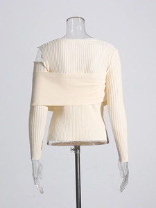 Minimalist cream white off-shoulder knit sweater with back cutout and ribbed texture