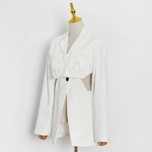 Chic white padded shoulder blazer with waist cut-outs and structured corset design