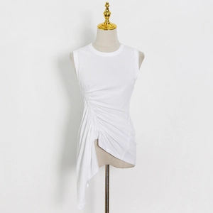 Detailed close-up of white ruched tank top featuring irregular hem and side pleats