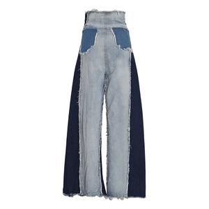 High waist wide leg patchwork denim jeans with distressed frayed edges in blue tones