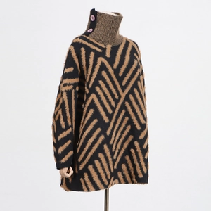 Detail of high collar with decorative buttons on geometric striped mink fur knit sweater