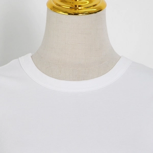 Detail of white crew neck T-shirt featuring high-quality double-needle stitching and fabric