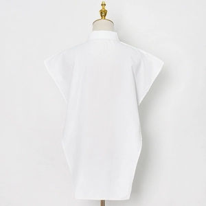 Rear view of white minimalist stand collar shirt featuring a structured wide shoulder silhouette
