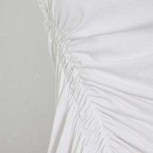 Detailed close-up of side ruched drawstring design on a white slim fit cotton t-shirt