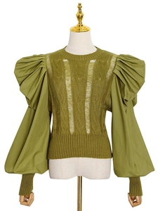 Slim fit grass green knit top featuring hollowed out patterns and puff sleeve details