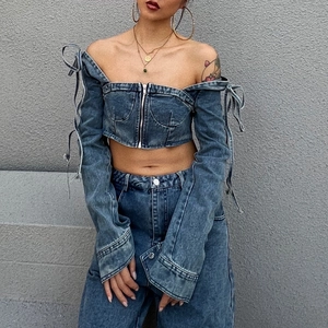 Denim two-piece set featuring a zip-up off-shoulder long sleeve top and wide-leg jeans