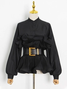 Elegant black long sleeve ruffled shirt featuring a wide waist belt with a gold buckle
