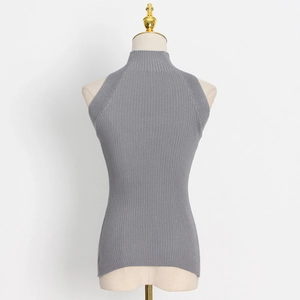 Detailed back view of grey ribbed knit sleeveless turtleneck vest showing premium texture